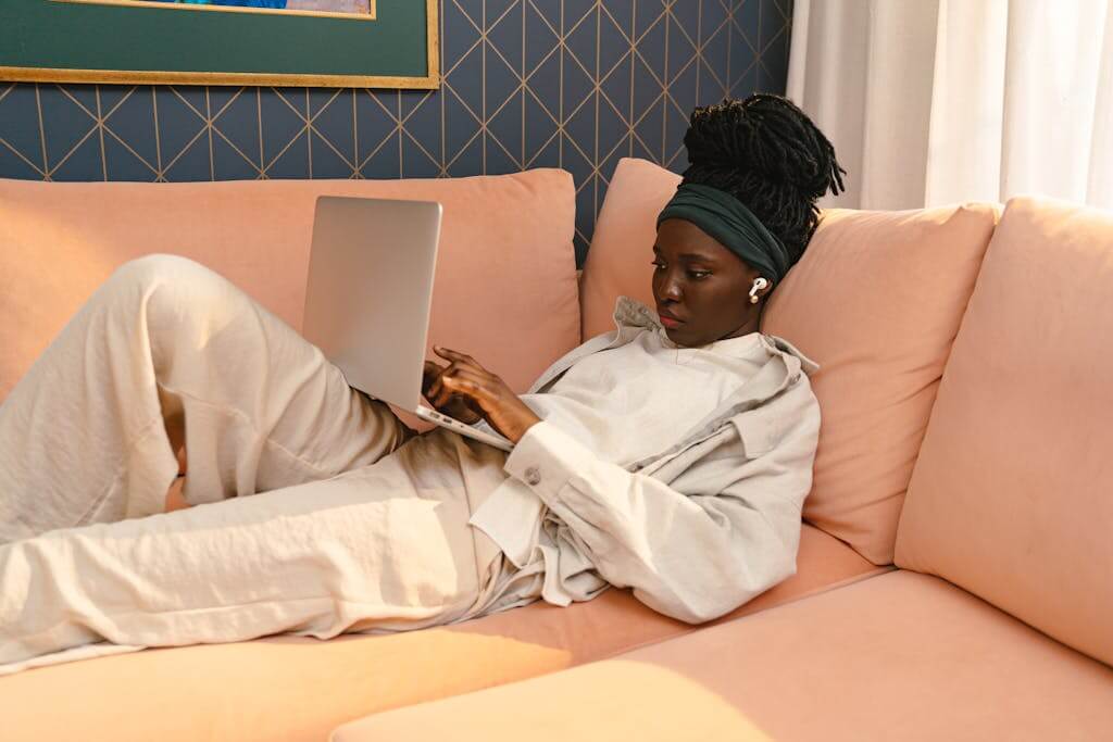Online therapy session for women in Asheville NC with Mosaic Reflections Therapy Woman connecting with her online therapist from a cozy home in Asheville, NC during a virtual therapy session | Brainspotting Therapist | Anxiety Counseling | Therapy for Depression | Trauma Therapist