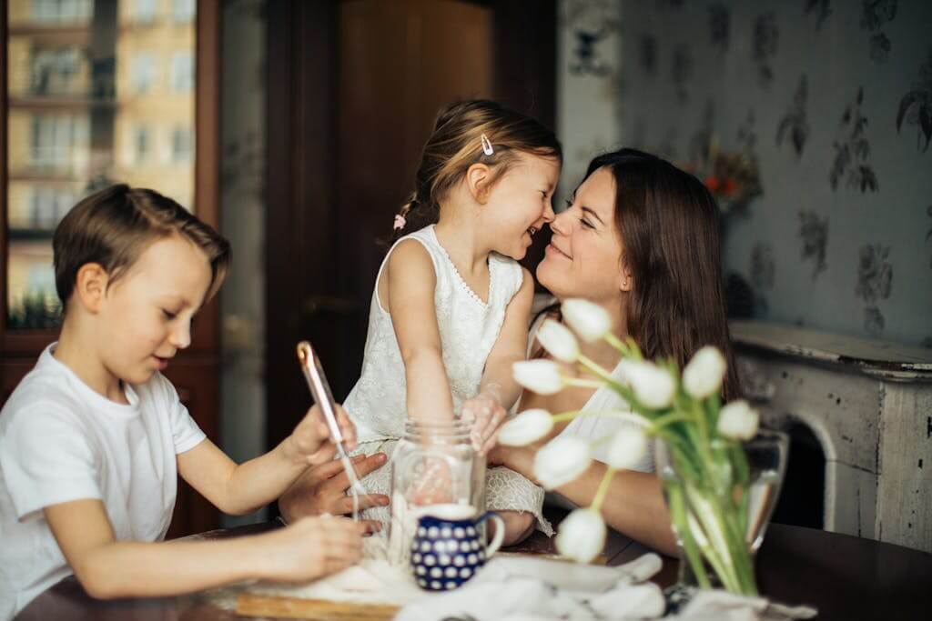 A woman with her kids after parenting support therapy in Chapel Hill, NC | Therapy for Moms | Brainspotting Therapist | Online Therapy in Chapel Hill