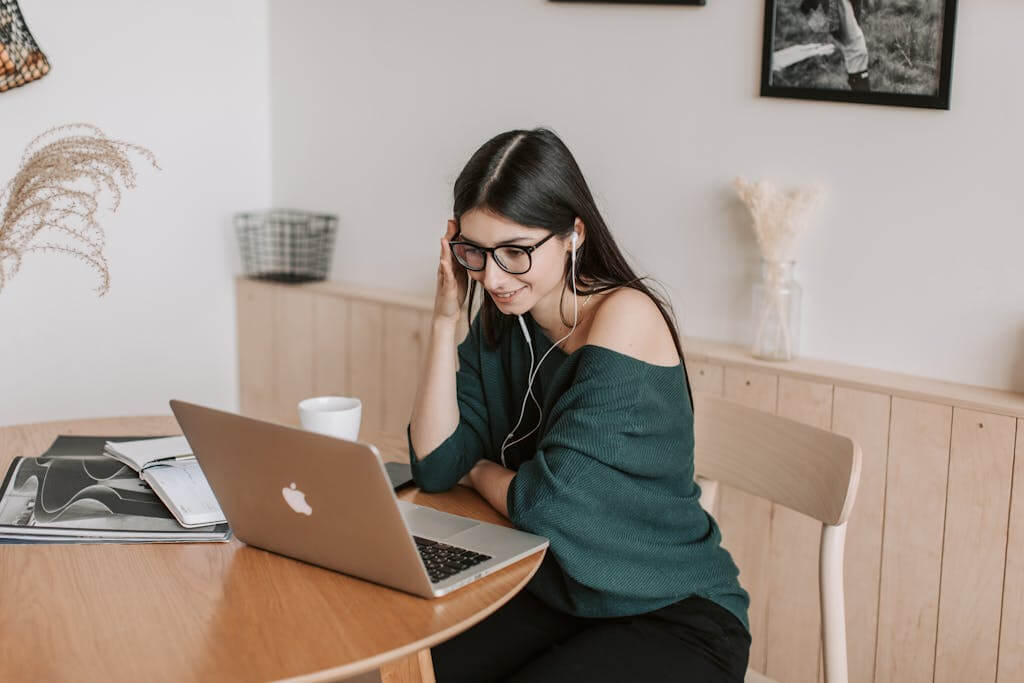 Woman attending a virtual therapy session from her home in Greenville NC with online therapist Eleena Hardzinski | Therapy for College Students | ECU Therapist | Anxiety Therapy | ADHD Therapy