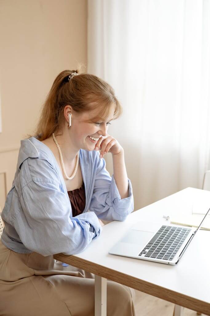 Woman attending a virtual therapy session from her home in Durham NC with online therapist Eleena Hardzinski | Trauma Therapy | Therapy for Overwhelmed Moms | Brainspotting Therapist